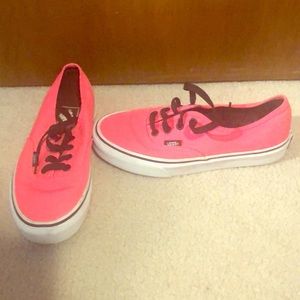 Neon pink vans.